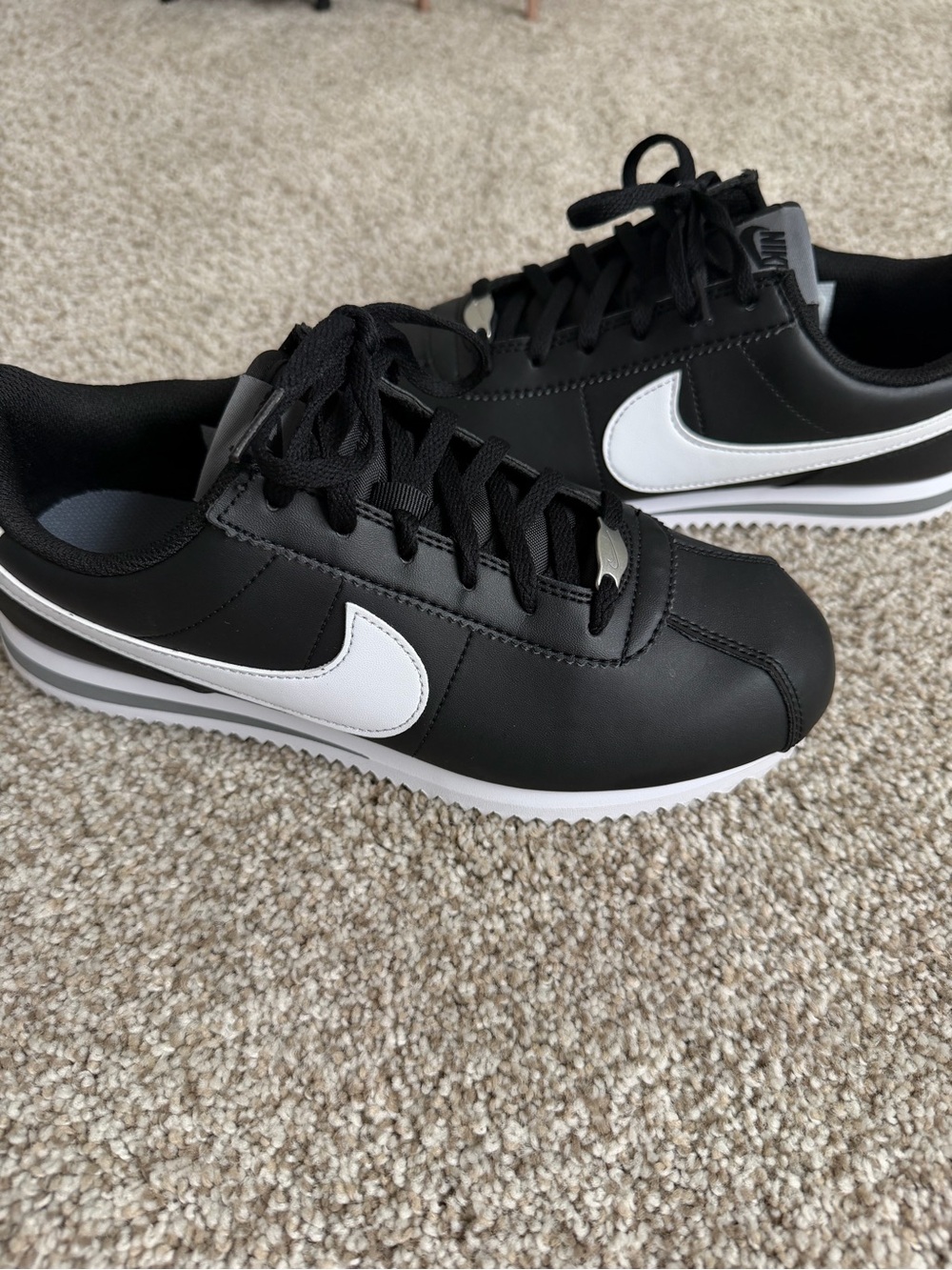 Nike Black and White Low-Top Swoosh Sneakers